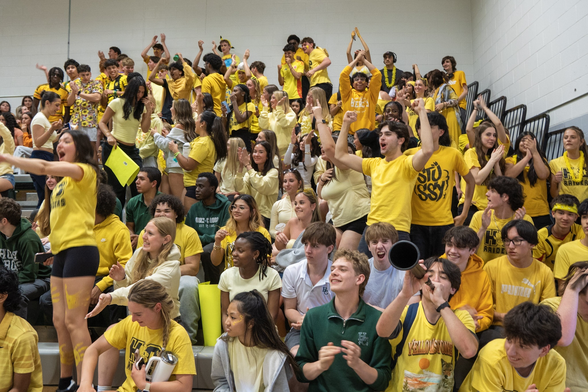 Crowd of students cheering in the stands